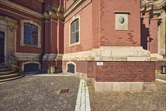 Facade with memorial plaque to Ernst Georg Sonnin, the builder of the main church of St Michaelis,