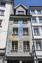 Artistically painted façade on a town house in Spisergasse, monastery quarter, historic old town of