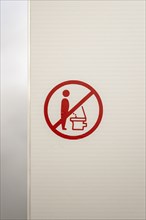 Pictogram, prohibition sign in a public toilet, peeing, urinating while standing prohibited, Canton