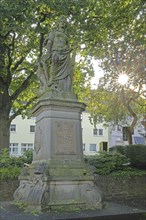 War memorial with statue of Germania against the light, Fissmer-Anlage, Siegen, Siegerland, North