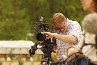 Cameraman and sound recordist at work