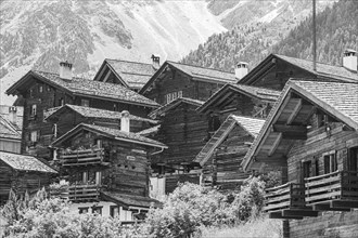 Nested old wooden houses, historic village centre, black and white photograph, Grimentz, Val