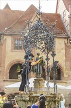 The Gänseliesel fountain is a market and ornamental fountain on the market square in front of the