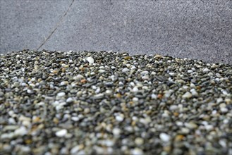 BAckground of smooth rocks found on a West Coast beach, South Island, New Zelaand