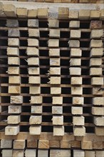 Piles of timber cut from Pinus radiata are laid out to dry at the sawmill