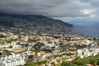 Funchal City and Mountains on Cloudy Day. Pico dos Barcelos Viewpoint. Madeira, Portugal, Europe