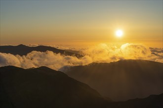 Pico Ruivo. Mountain Peaks at Sunset. Cloud Inversion. Golden Hour. Madeira, Portugal, Europe