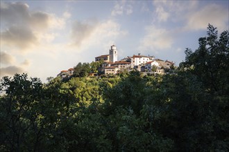 Fantastic sunset on a mountain. Great panorama of a mountain village on the Mediterranean.