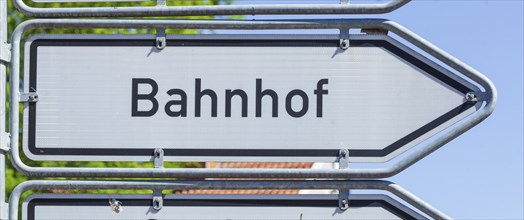 Road sign Signpost to railway station, Germany, Europe