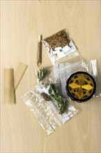 Close up of a bag of marijuana with tobacco, Top view of marijuana with tobacco on the table