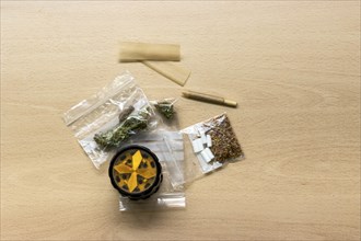 Close up of a bag of marijuana with tobacco, Top view of marijuana with tobacco on the table