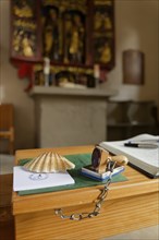 Pilgrim's stamp and pilgrim's guest book in the Wolfgangskirche, rose garden-Tullau, Tullau,