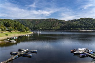 Small marina, jetty, sailing boats, view of the Rursee, Eifel National Park, North