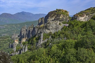 Meteora landscape with four Monasteries situated at the top of various rocky cliffs, famous tourism