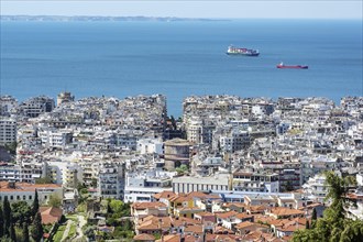 Thessaloniki city, aerial panoramic view over the houses, the tower Rotunda of Galerius and the