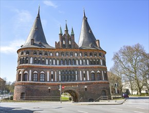 Holstentor (Holsten gate), famous historic landmark with two round towers and entrance of the