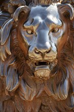 Head of a lion statue made from cast iron, the monument is located in Lubeck Germany in front of