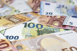 Different euro banknotes, money concept for economy, business and finance, close up with copy