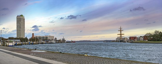 Lubeck Travemunde, Germany, January 15, 2023: Panorama with exciting sky, opening of the river