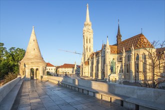 Old historic fortress and church at sunrise. City panorama at dusk. View of the Danube Fishermen's