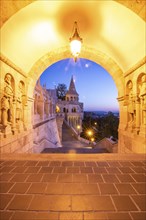 Old historic fortress and church at sunrise. City panorama at dusk. View of the Danube Fishermen's