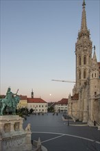 Old historic fortress and church at sunrise. City panorama at dusk. View of the Danube Fishermen's