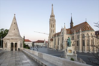 Old historic fortress and church at sunrise. City panorama at dusk. View of the Danube Fishermen's