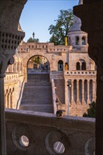 Old historic fortress and church at sunrise. City panorama at dusk. View of the Danube Fishermen's