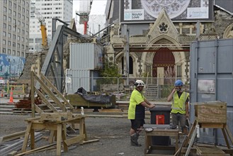 CHRISTCHURCH, NEW ZEALAND, FEBRUARY 24, 2022: A team of tradesmen work on the Anglican Cathedral