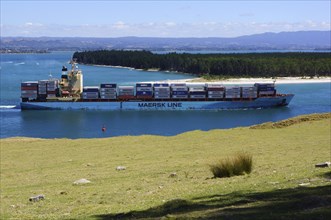 TAURANGA, NEW ZEALAND, FEBRUARY 16, 2013:A container ship for the Maersk line departs from the Port