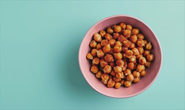 Roasted chickpeas with paprika in a pastel pink bowl AI generated