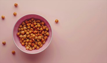 Roasted chickpeas with paprika in a pastel pink bowl AI generated