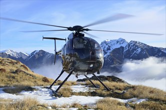 Helicopter waiting for hunters in South Westland's Southern Alps, New Zealand, Oceania