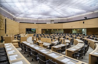 State parliament of Baden-Württemberg, assembly hall with state coat of arms. The seats of the