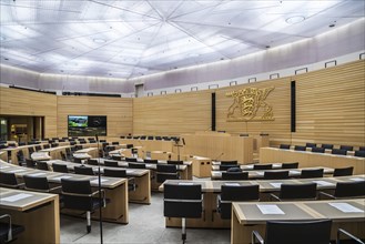 State parliament of Baden-Württemberg, assembly hall with state coat of arms. The seats of the