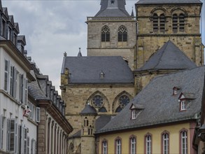 Parish church in the old town, gothic style with medieval stone facades and grey roofs under a