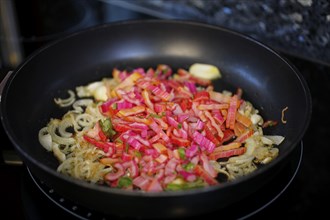 Swabian cuisine, preparation of chard for stuffed pancakes with pine nuts, sauté vegetables and