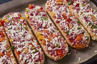 Pizza on a baguette, top view, close-up, no people, fast food, street food