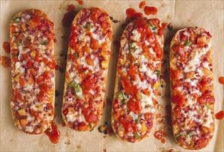 Pizza on a baguette, top view, close-up, no people, fast food, street food