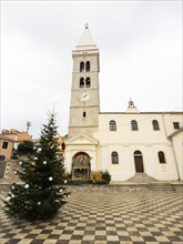 Christmas tree on the church square, Church of the Nativity of the Virgin Mary, Mali Losinj,