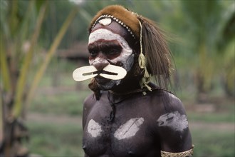 Asmat people: ethnic group living in the Papua province of Indonesia, along the Arafura Sea. Asmat