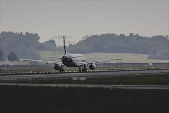 An aircraft on the runway, photographed at Berlin Brandenburg Airport 'Willy Brandt'Äô (BER) in