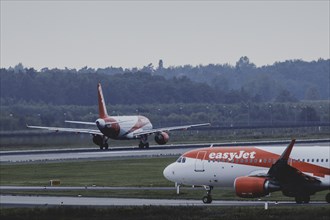 Two aircraft of the low-cost airline easyjet, photographed at Berlin Brandenburg Airport 'Willy