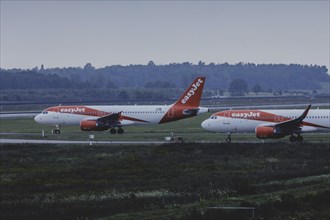 Two aircraft of the low-cost airline easyjet, photographed at Berlin Brandenburg Airport 'Willy