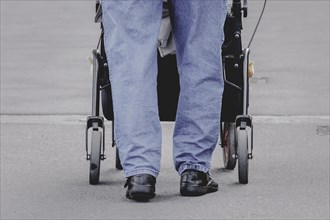 A woman with a rollator, photographed in Berlin, 07/08/2024