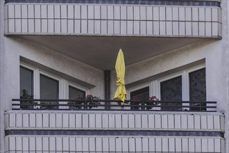 A parasol on a balcony of a block of flats, taken in Berlin, 07/08/2024