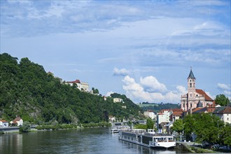 View over Danubia river on 'Veste Oberhaus' ant the church, Passau, Bavaria, Germany, Europe