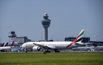 Aircraft at Amsterdam Schiphol Airport, taking off on the Aalsmeerbaan, 18L/36R, Emirates Boeing