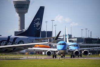 Aircraft at Amsterdam Schiphol Airport, on the taxiway for take-off on the Aalsmeerbaan, 18L/36R,