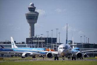 Aircraft at Amsterdam Schiphol Airport, on the taxiway for take-off on the Aalsmeerbaan, 18L/36R,